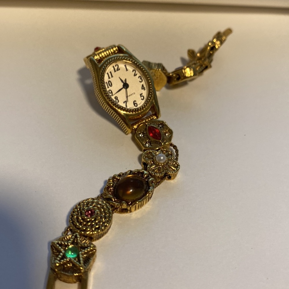 Vintage Avon sliding charm watch